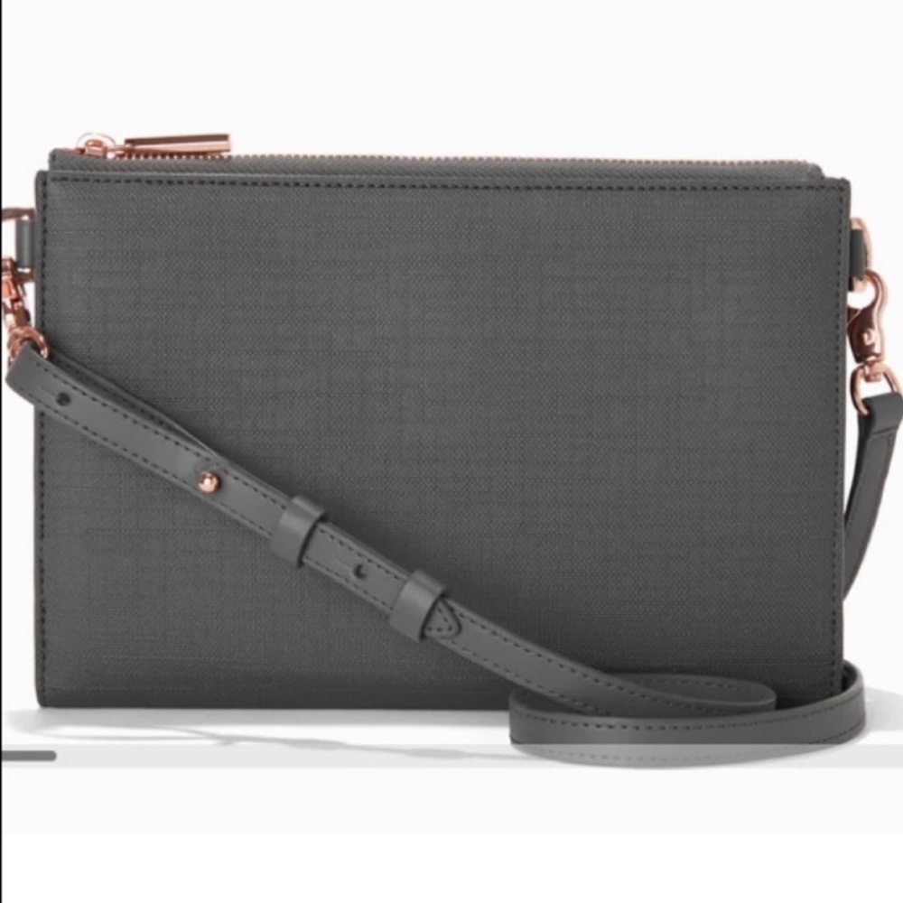 Never used. Brand new with tags Dagne Dover wallet clutch in Graphite colour.
